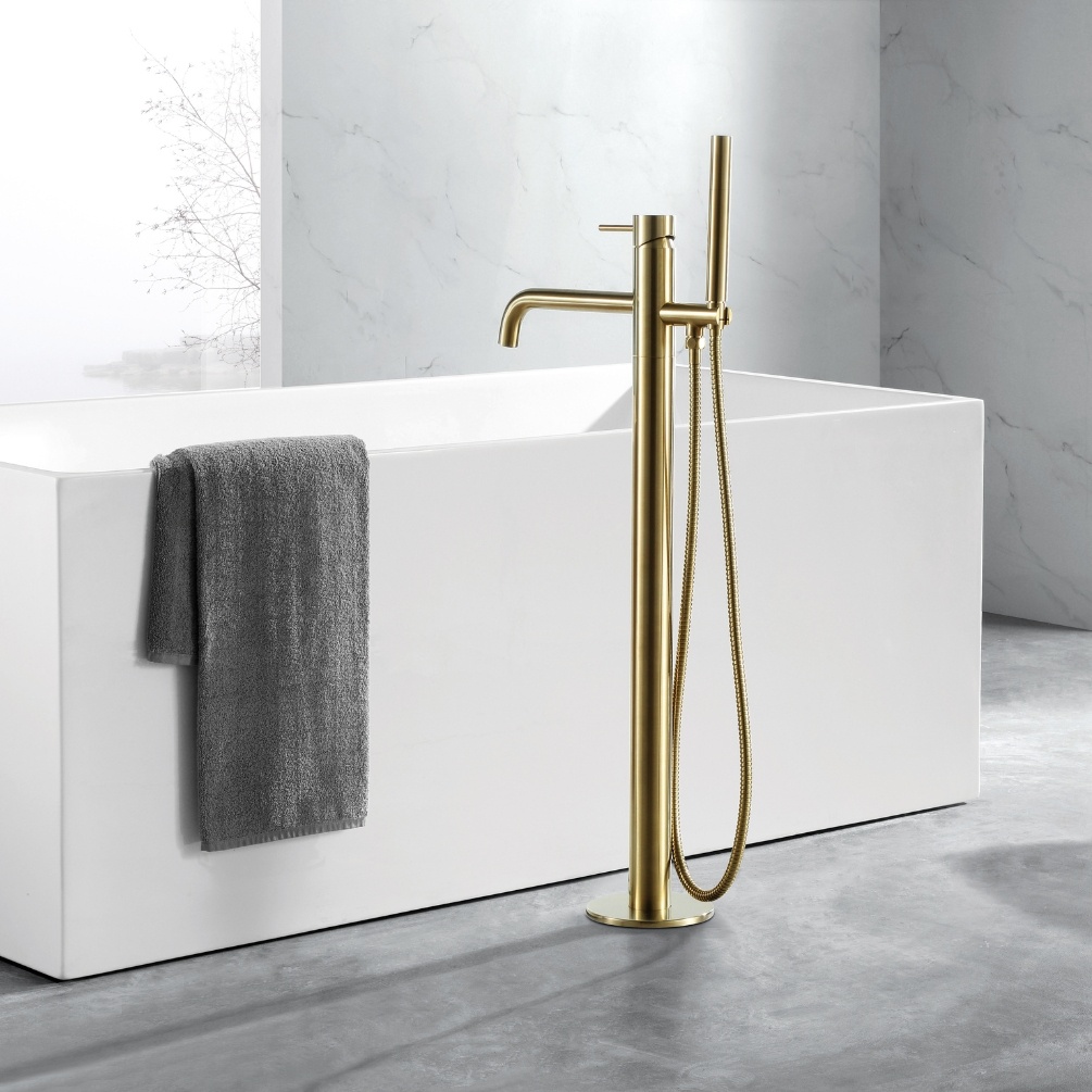 Product Lifestyle image of the JTP Vos Brushed Brass Freestanding Bath Shower Mixer with Designer Knurled Handles